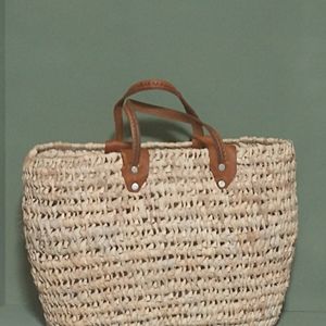 Woven, straw, rattan tote bag with leather handles